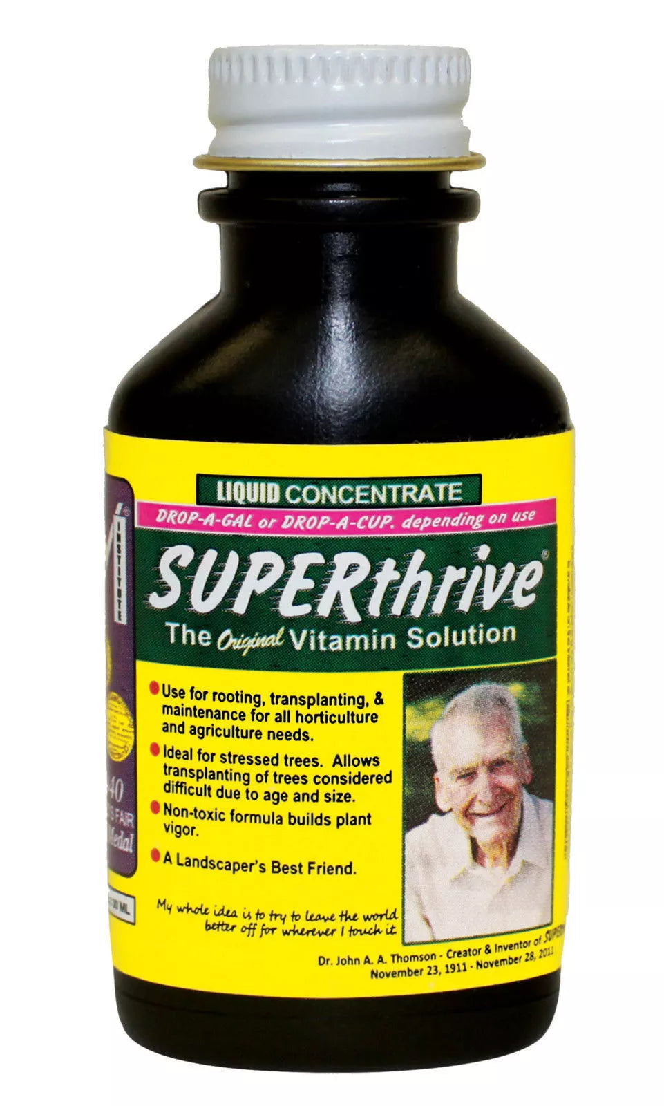 SUPERthrive plant vitamin supplement, a bottle of kelp and Vitamin B growth formula